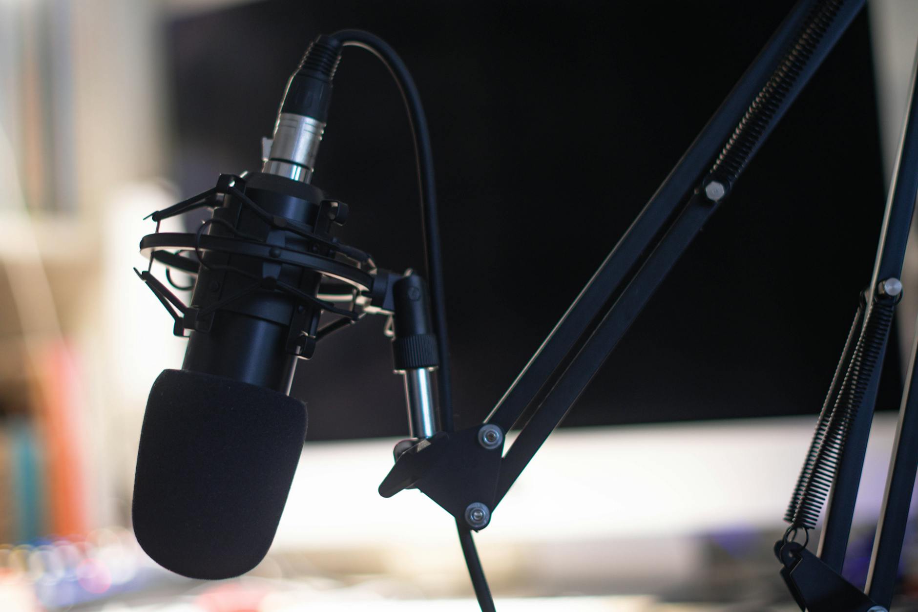 Close-up of a condenser studio microphone, illustrating the voice-AI category in which ElevenLabs operates