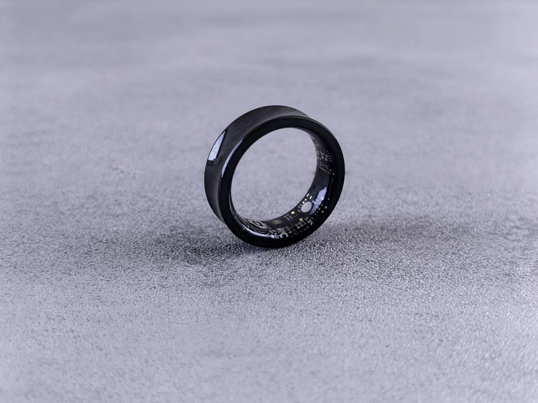 Close-up smart ring product shot, useful for weighing comfort, size and battery trade-offs in small wearables.