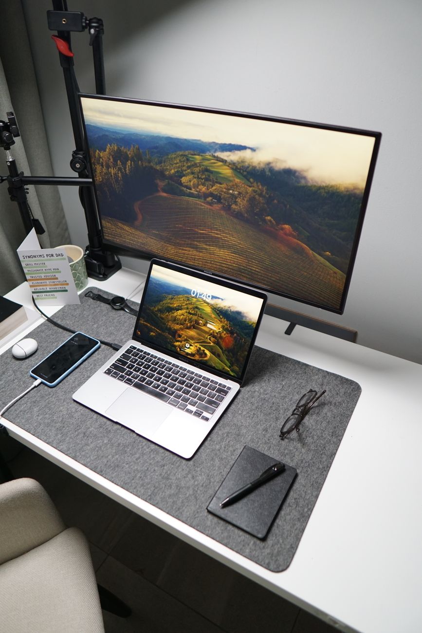 Desk setup with a laptop and external monitor, illustrating the portable-monitor buying guide