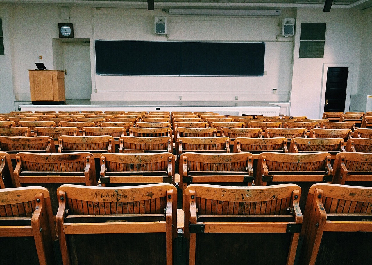 University lecture theatre seating for a story about AI disclosure rules in education
