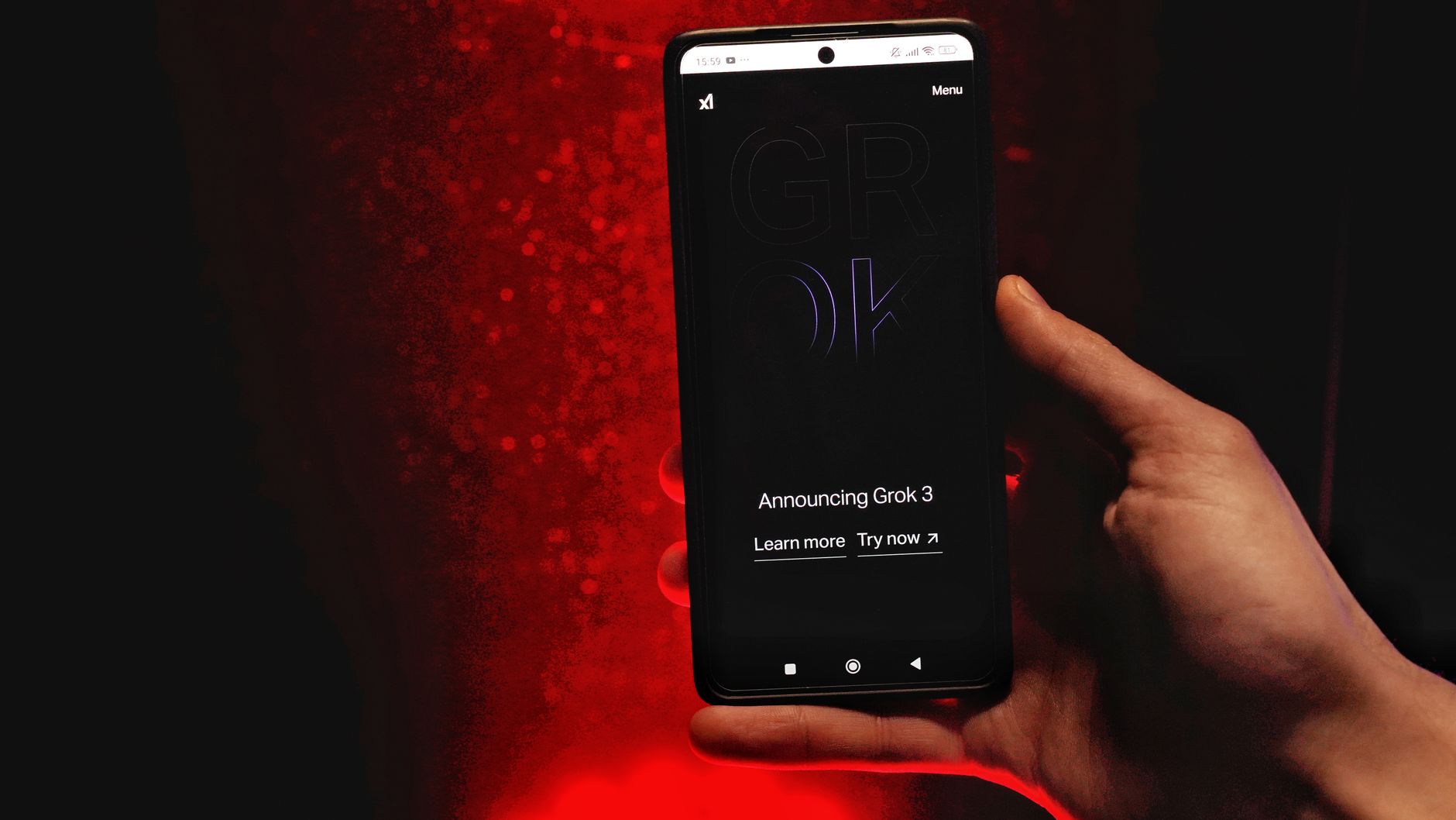 A smartphone displaying a Grok announcement, used to illustrate xAI safety scrutiny