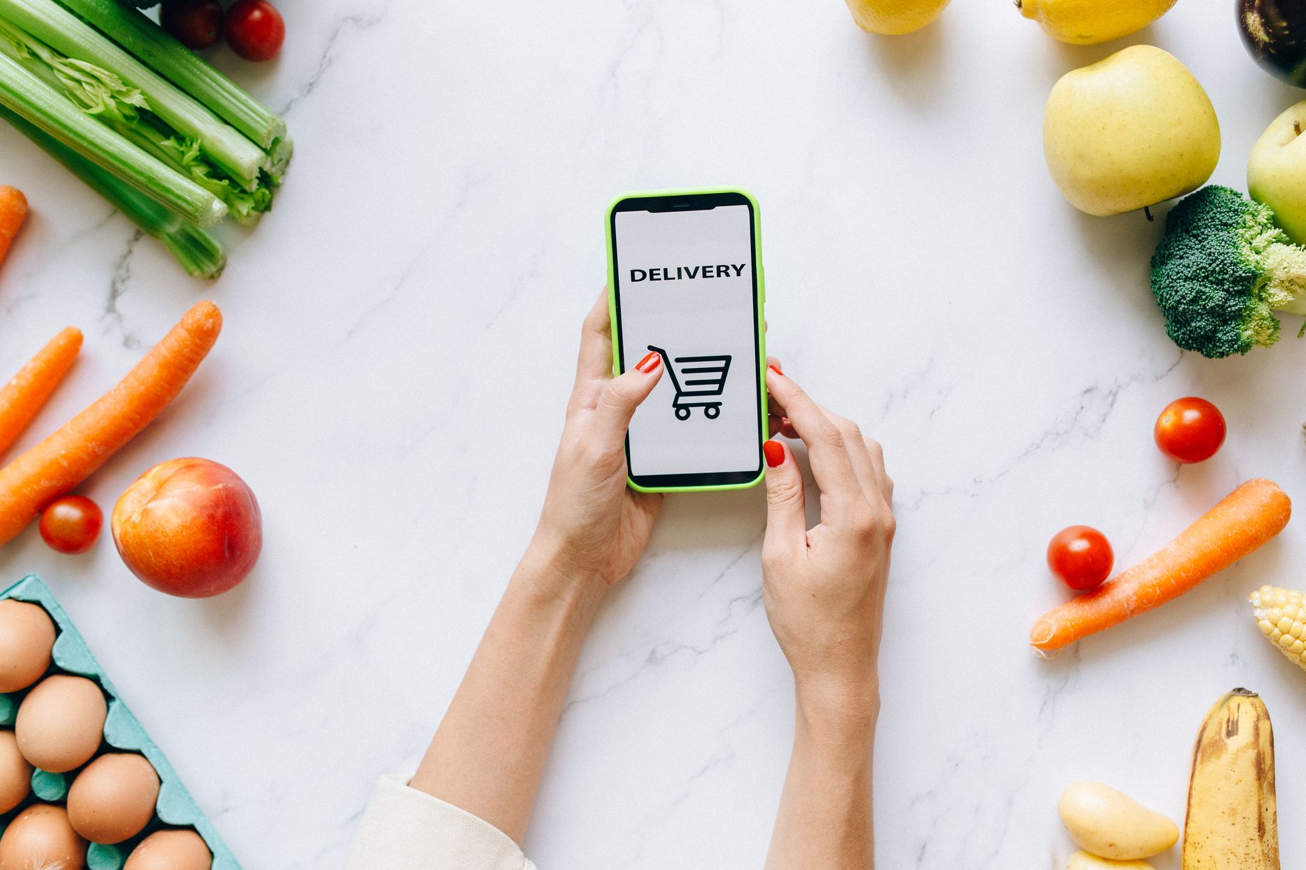 Smartphone displaying a grocery delivery app during a service disruption